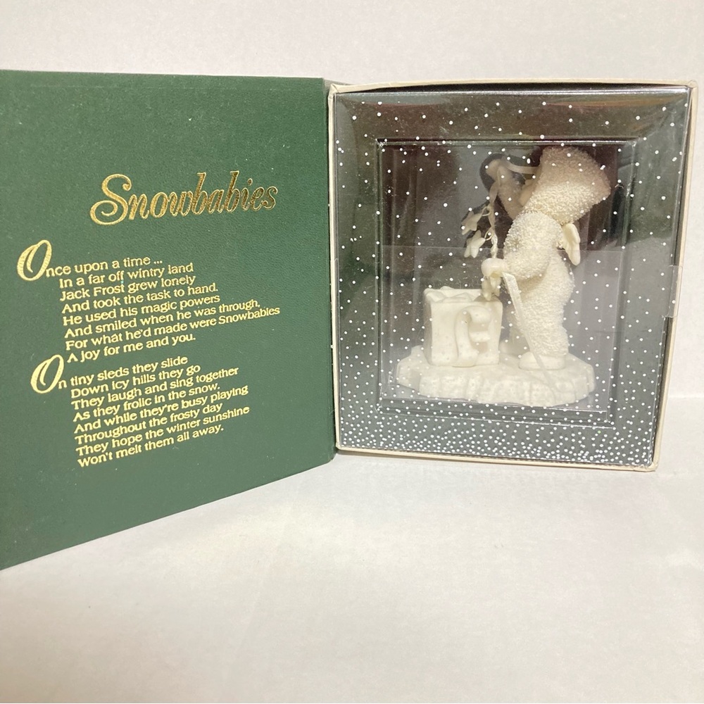 Snowbabies Winter Tales “Stringing Fallen Stars”. Retired 1990’s. New in box.